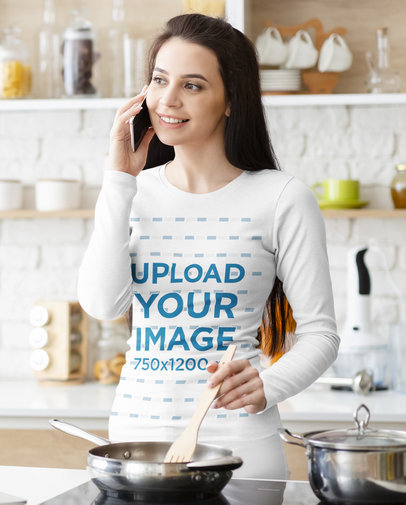 Long-Sleeve Tee Mockup of a Long-Haired Woman Cooking While Making a Call 