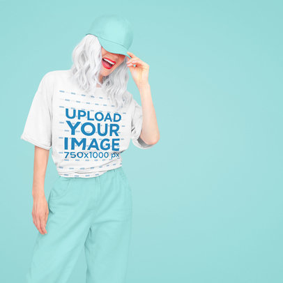 Oversized T-Shirt Mockup of a Happy Woman With Silver Hair 