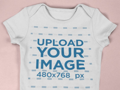 Closeup Onesie Mockup on a Solid Background