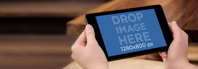 Mockup of a Black Nexus 7 Being Held in Landscape Mode