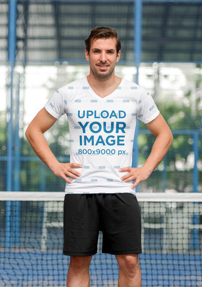 Mockup of  an Athletic Man Wearing a Sublimated V-Neck Tee in a Tennis Court 41415-r-el2