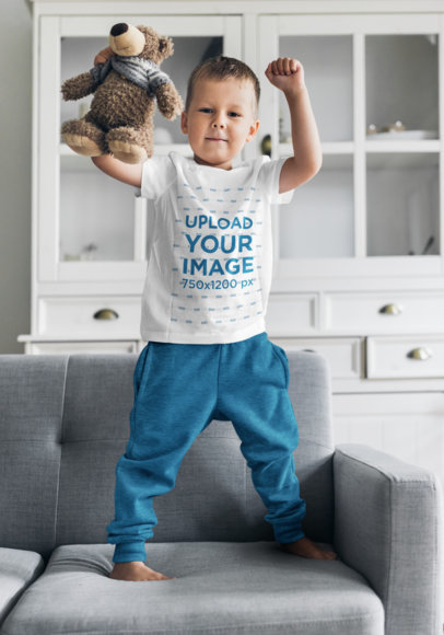 T-Shirt Mockup of a Little Boy Playing in His Living Room