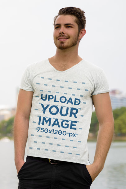 T-Shirt Mockup of a Man Posing with His Hands in His Pockets