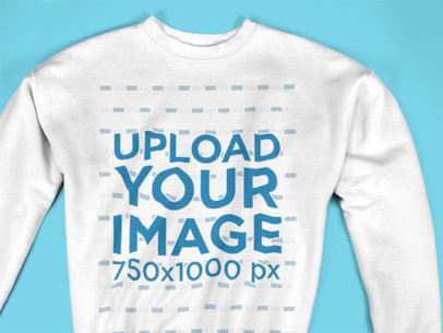 Closeup of a Crewneck Sweatshirt Mockup Lying on a Flat Surface a15246