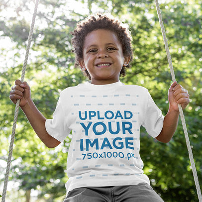 T-Shirt Mockup of a Happy Boy Playing on a Swing 40491-r-el2