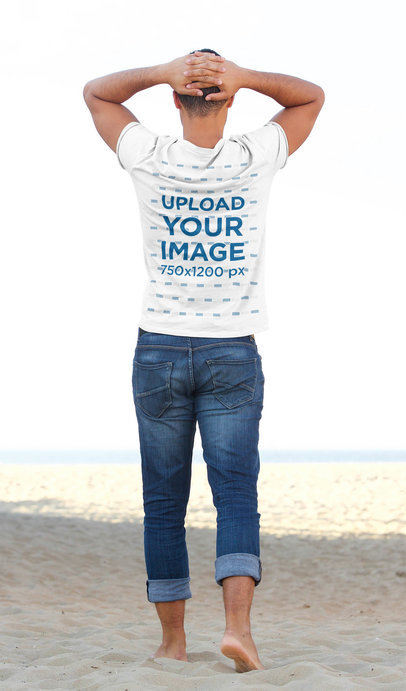 T-Shirt Mockup of a Man Walking Towards the Sea