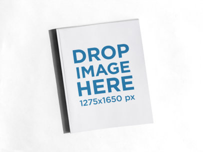 Magazine Floating Over a Solid Color Surface