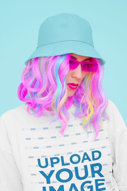Oversized T-Shirt Mockup of a Colorful-Haired Woman at a Studio