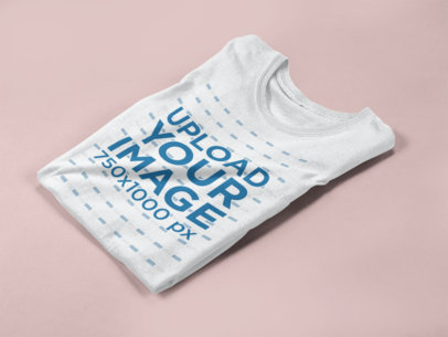 Folded Tshirt Mockup Lying on a Solid Surface