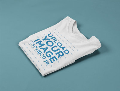 Mockup of a Folded Kids' Tshirt on a Solid Surface a15262