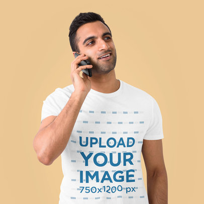 T-Shirt Mockup Featuring a Man on the Phone Standing in a Studio 40298-r-el2