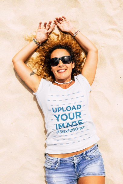 T-Shirt Mockup Featuring a Woman Lying on the Sand 45754-r-el2
