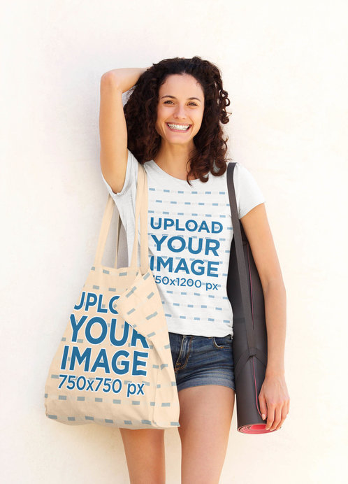 T-Shirt Mockup of a Happy Curly-Haired Woman Carrying a Tote Bag