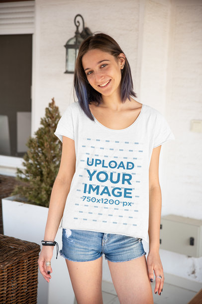 Mockup of a Smiling Woman Wearing a Slouchy T-Shirt