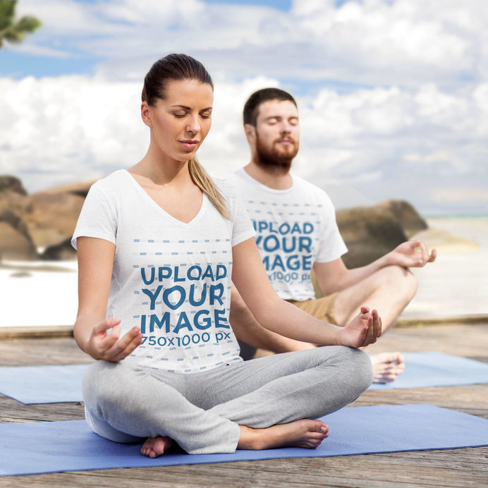 T-Shirt Mockup of a Woman and a Man Meditating by The Sea