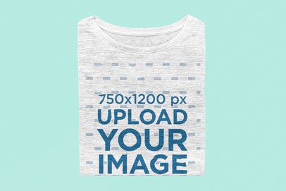 Mockup of a Folded Heathered T-Shirt on a Customizable Surface