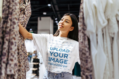 T-Shirt Mockup of a Woman Shopping for Clothes