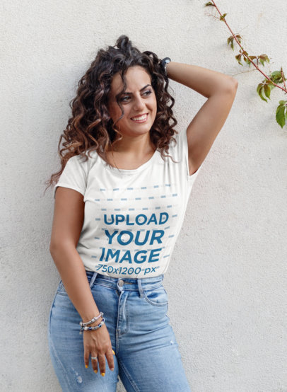 Mockup of a Curly-Haired Woman Wearing a Tucked T-Shirt