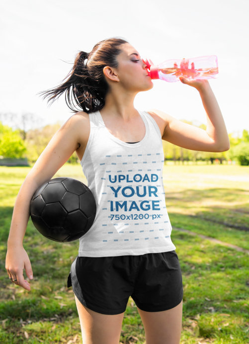 Tank Top Mockup of a Female Soccer Player Drinking Water