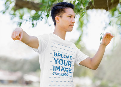 T-Shirt Mockup Featuring a Man Doing Outdoor Tai Chi 44404-r-el2