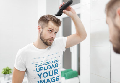 T-Shirt Mockup of a Man Cutting His Own Hair in the Mirror