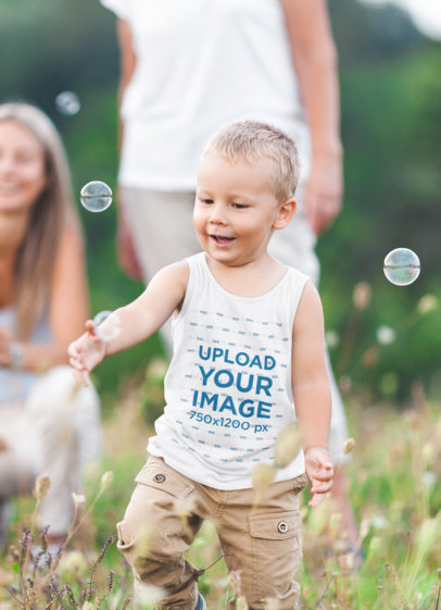Heathered Tank Top Mockup of a Little Boy Chasing a Bubble