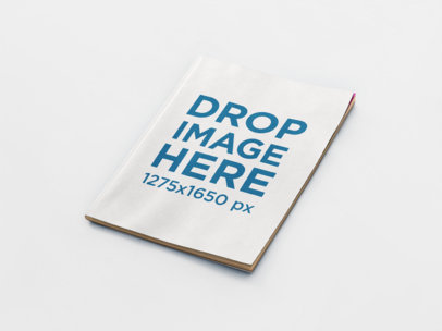 Template of a Magazine Lying on a Solid Color Surface