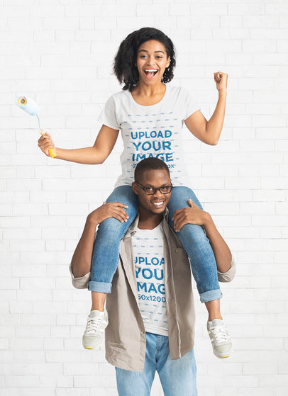 T-Shirt Mockup Featuring a Woman Sitting on Her Boyfriend's Shoulders 40216-r-el2