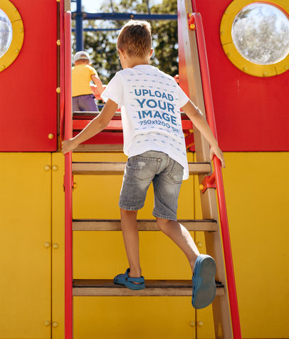 Back-View T-Shirt Mockup of a Boy at a Playground