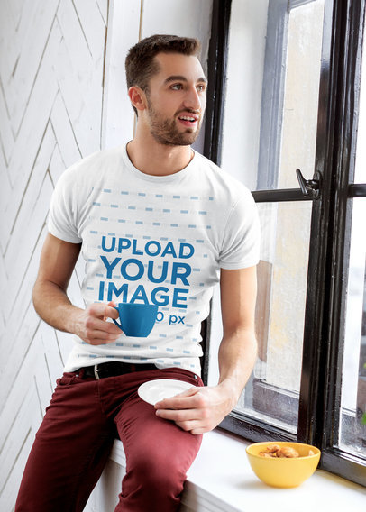 T-Shirt Mockup of a Man Drinking Tea by a Window 42035-r-el2