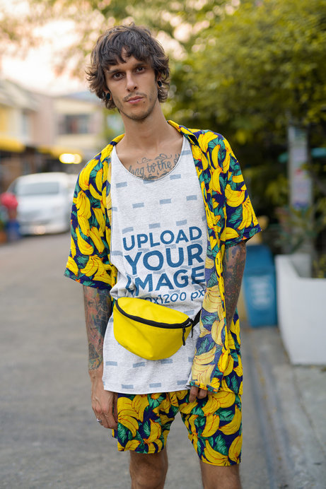 Mockup of a Young Man Wearing an Oversized Sublimated Tank Top