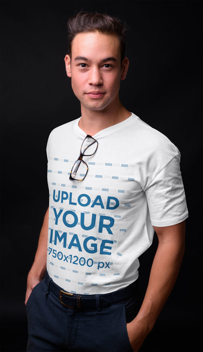 T-Shirt Mockup Featuring a Stylish Man Posing in a Studio 40352-r-el2