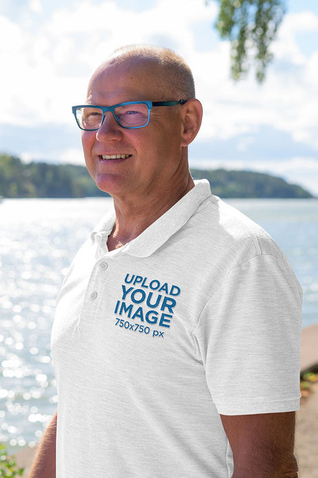 Heathered Polo Shirt Mockup Featuring a Man Standing by a Lake