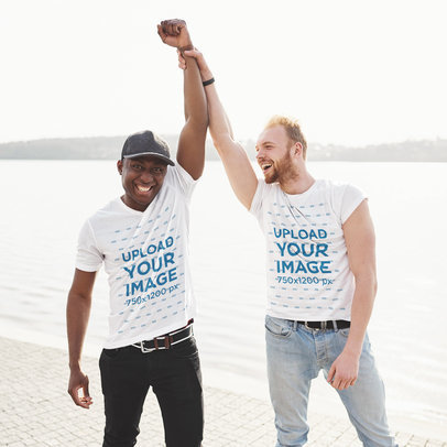 Tee Mockup of Two Joyful Friends Raising Their Fists Up 42689-r-el2