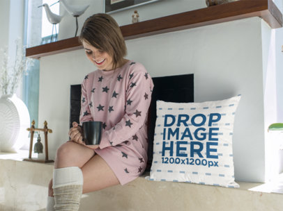 Young Woman in Night Suit Having a Tea in the Morning While Sitting Next to a Pillow Template a14945