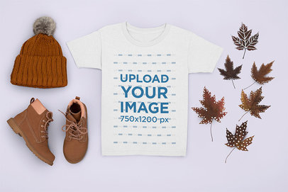 T-Shirt Mockup Featuring a Kid's Autumn Outfit