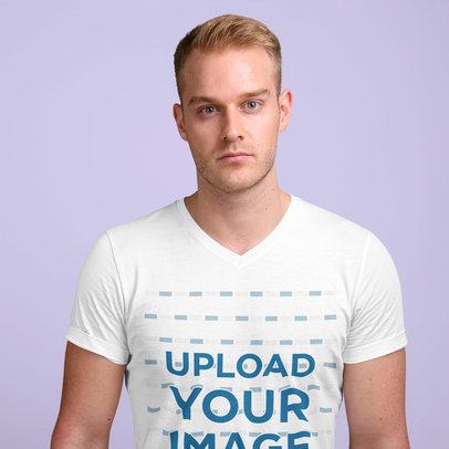 V-Neck Tee Mockup of a Serious Man Standing at a Studio