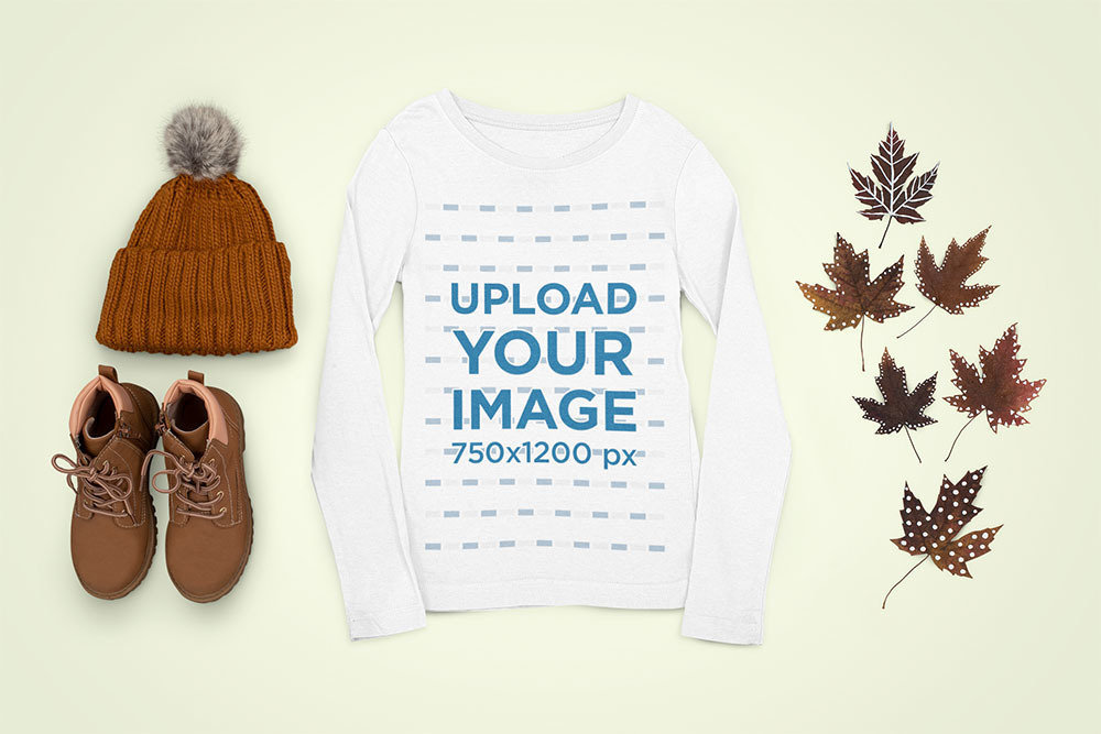 Mockup of a Flat Laid Long Sleeve Tee by Autumn-Season Adorns