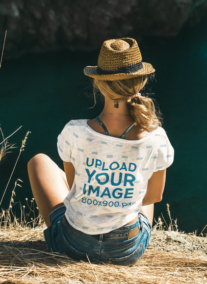 Back-View T-Shirt Mockup of a Woman Sitting Outdoors 42164-r-el2