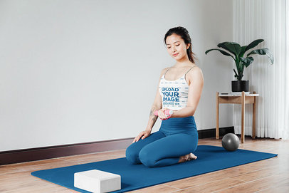 Tank Top Mockup of a Young Woman Exercising in Her Living Room