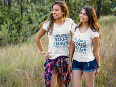 Pair of Women Wearing Different Tshirts While Standing Outdoors