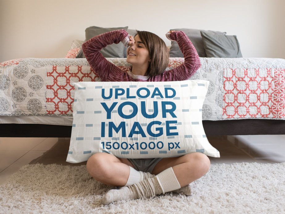 Young Woman Waking up Sitting Down with a Big Pillow Mockup