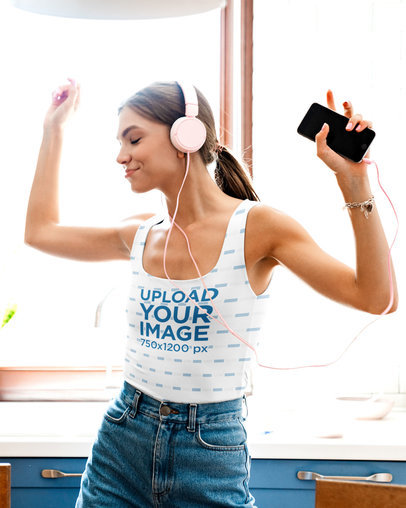 Tank Top Mockup of a Woman Enjoying Some Music at Home