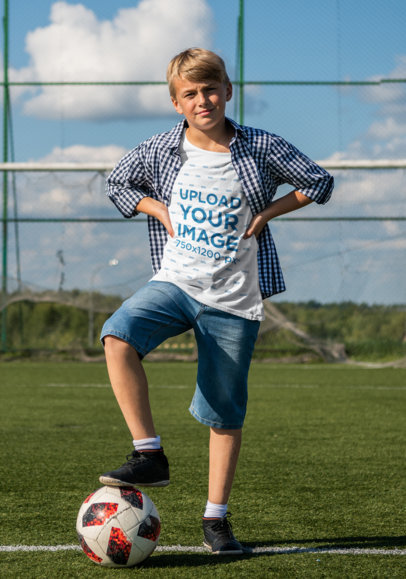 T-Shirt Mockup of a Boy at a Soccer Field