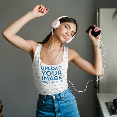 Sublimated Tank Top Mockup of a Woman Enjoying Some Music at Home