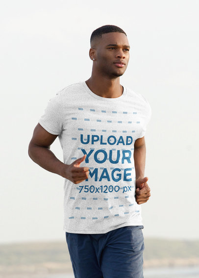 Heathered T-Shirt Mockup Featuring a Young Man Jogging