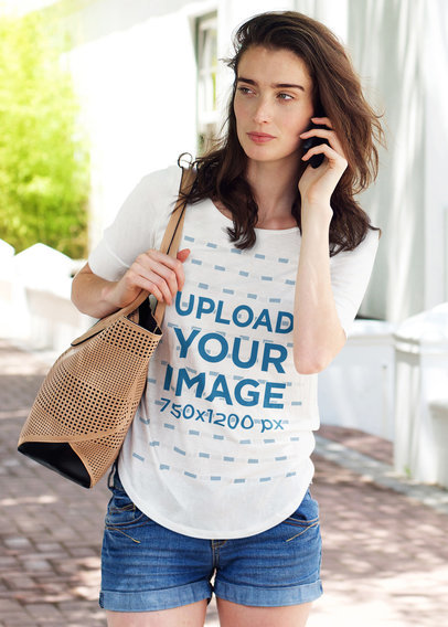 T-Shirt Mockup of a Serious Woman on the Phone 