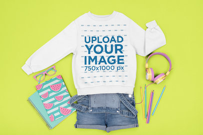 Mockup of a Sweatshirt Surrounded by Girly Items
