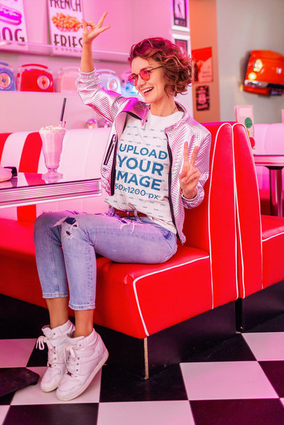 Round-Neck Tee Mockup Featuring a Woman Inside a Retro Restaurant
