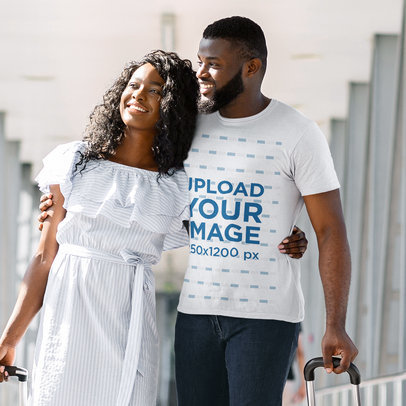 Basic T-Shirt Mockup of a Bearded Man and His Girlfriend at the Airport 